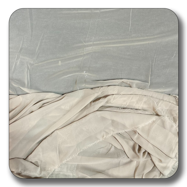 High-quality polyester chiffon fabric in soft, lightweight texture, perfect for versatile sewing projects and elegant drapes.