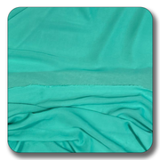 Soft teal polyester chiffon fabric with a smooth, lightweight texture, perfect for versatile sewing projects.