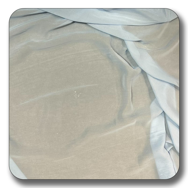 Light blue polyester chiffon fabric, lightweight and soft, ideal for sewing and crafting projects.