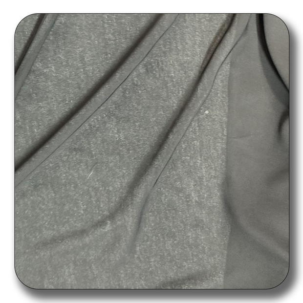 Close-up of soft gray polyester chiffon fabric, showcasing its smooth texture and lightweight quality.