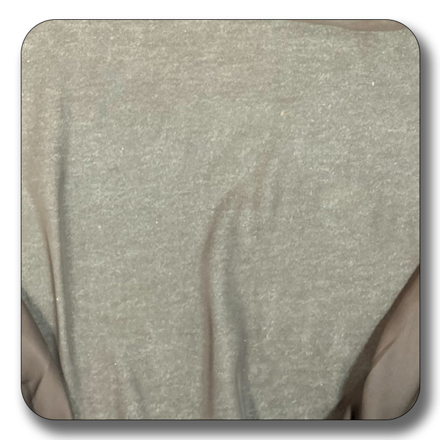 Close-up of soft polyester chiffon fabric in gray, showcasing its lightweight and durable texture, ideal for various sewing projects.