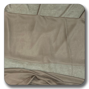Soft beige polyester chiffon fabric, lightweight and crease-resistant, sold by the yard for various crafting projects.