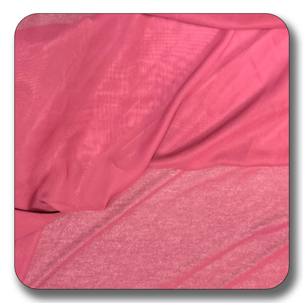 Soft pink polyester chiffon fabric, lightweight and durable, perfect for various sewing projects.