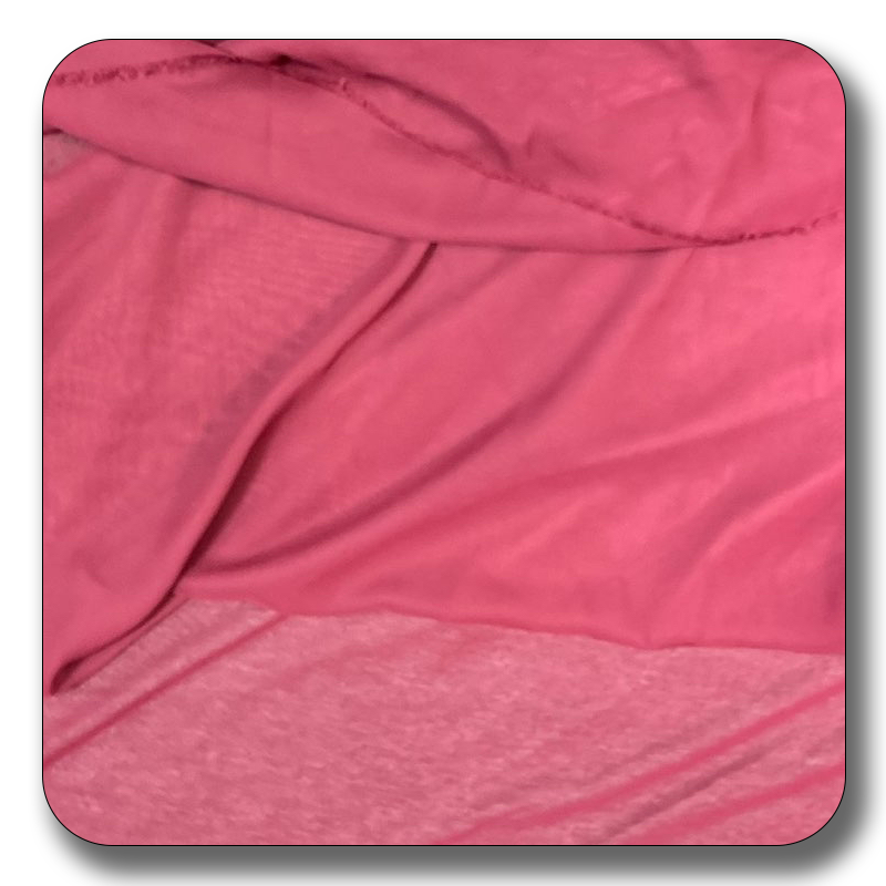 Soft pink polyester chiffon fabric, lightweight and durable, perfect for versatile sewing projects.
