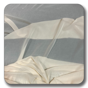 Soft, lightweight polyester chiffon fabric in cream color, perfect for sewing projects and versatile designs.