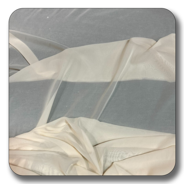Soft, lightweight polyester chiffon fabric in cream color, perfect for sewing projects and versatile designs.