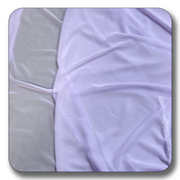 Soft lavender polyester chiffon fabric, lightweight, crease-resistant, and durable, sold by the yard for versatile projects.