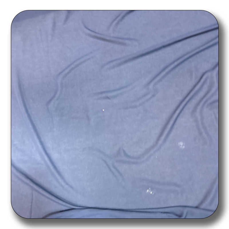 Soft polyester chiffon fabric in a rich blue color, showcasing its lightweight and durable texture.