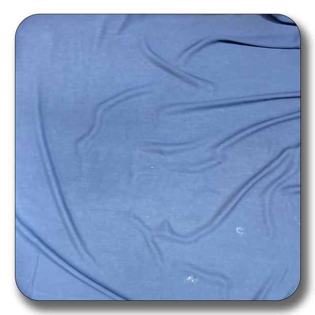 Soft polyester chiffon fabric in rich blue color, showcasing its lightweight and durable texture, perfect for sewing projects.