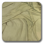 Soft polyester chiffon fabric in olive green, lightweight and wrinkle-resistant, sold by the yard for various projects.