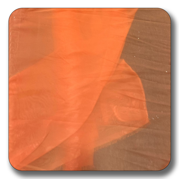 Close-up of lightweight orange chiffon fabric, showcasing its soft texture and elegant drape, perfect for various sewing projects.