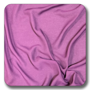Close-up of soft purple polyester chiffon fabric, showcasing its lightweight and creased texture.