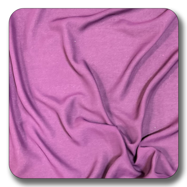 Close-up of soft purple polyester chiffon fabric, showcasing its lightweight and creased texture.