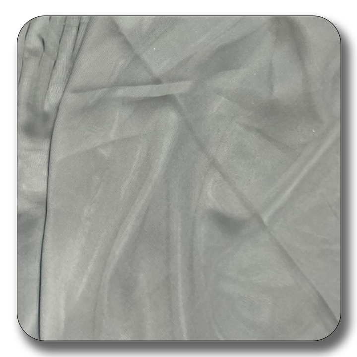 Close-up of soft gray chiffon fabric made from 100% polyester, showcasing its lightweight and durable texture.