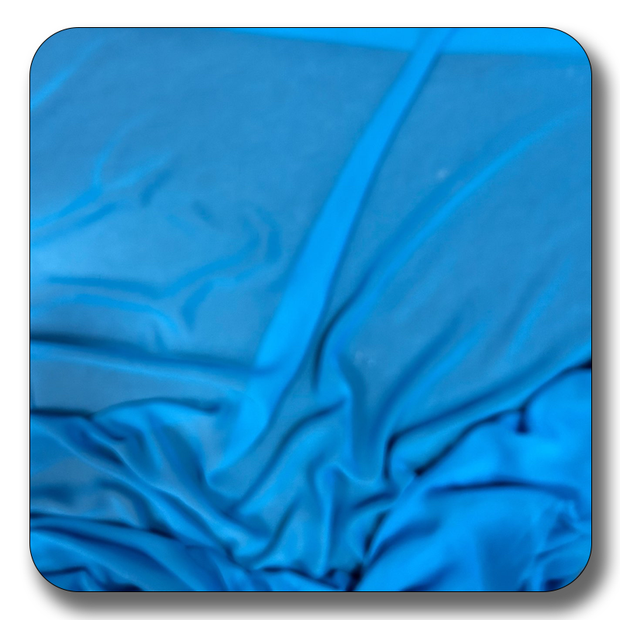 Close-up of blue polyester chiffon fabric showcasing its soft, durable texture and elegant drape, perfect for various sewing projects.